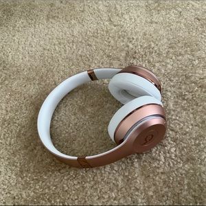 Rose gold beats by Dre headphones